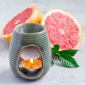 aromatherapy-lamp-with-grapefruit-essential-oil-copy-space-square.jpg